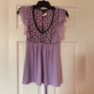 Cute fun summer top.  New size medium .